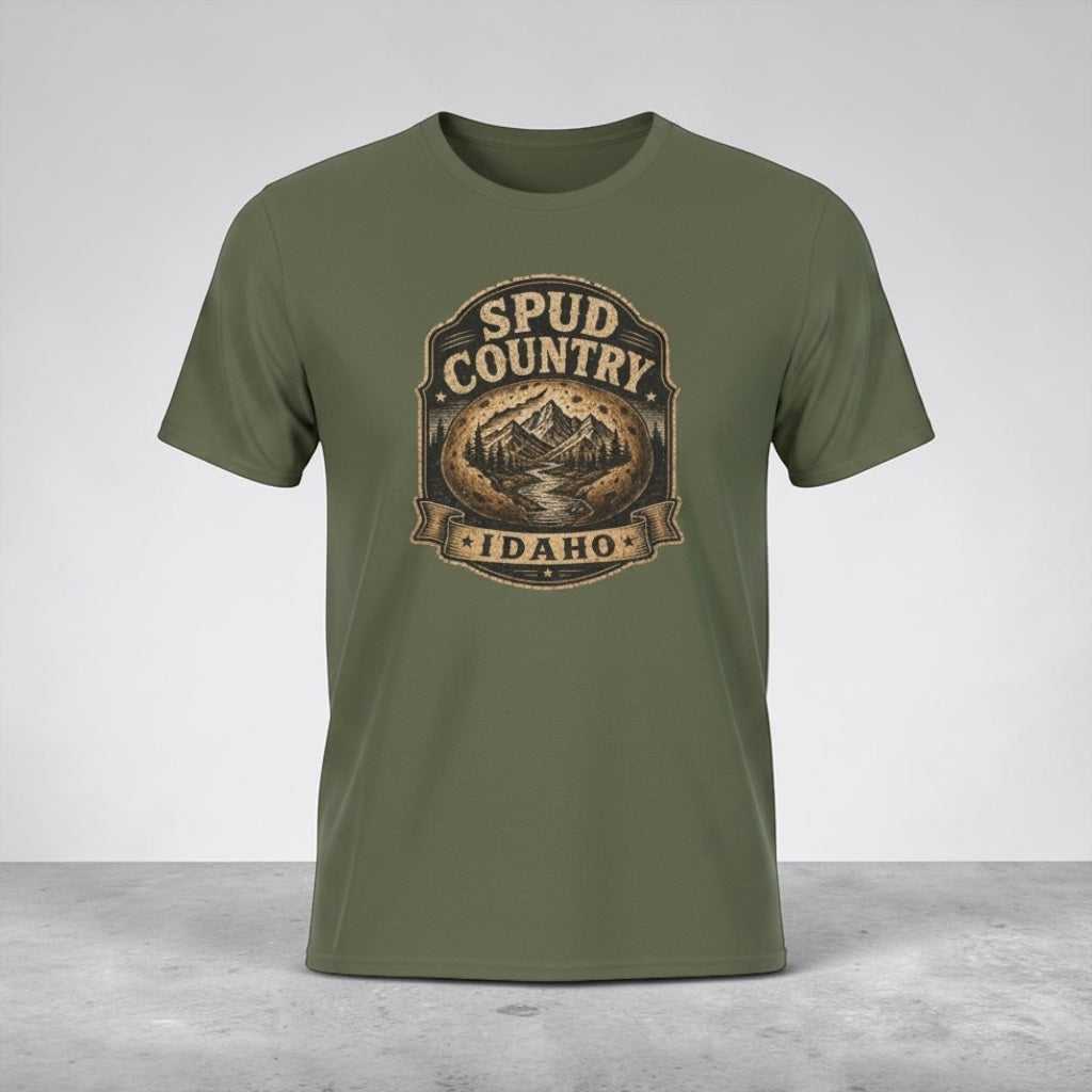 Vintage mountain potato badge graphic on olive green T-shirt for Idaho pride