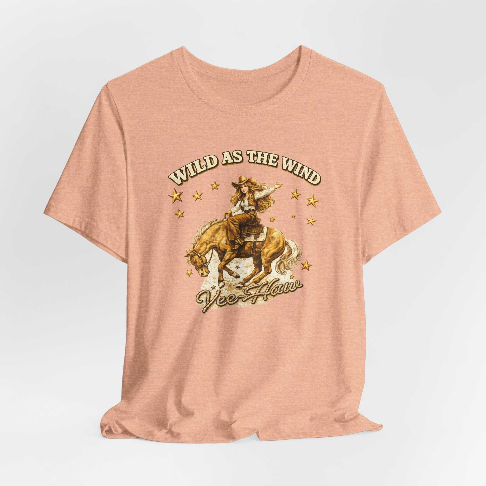 Wild as the Wind cowgirl T-shirt by Big Sky Ranch Co. featuring vintage western rodeo graphic on a casual cotton tee.