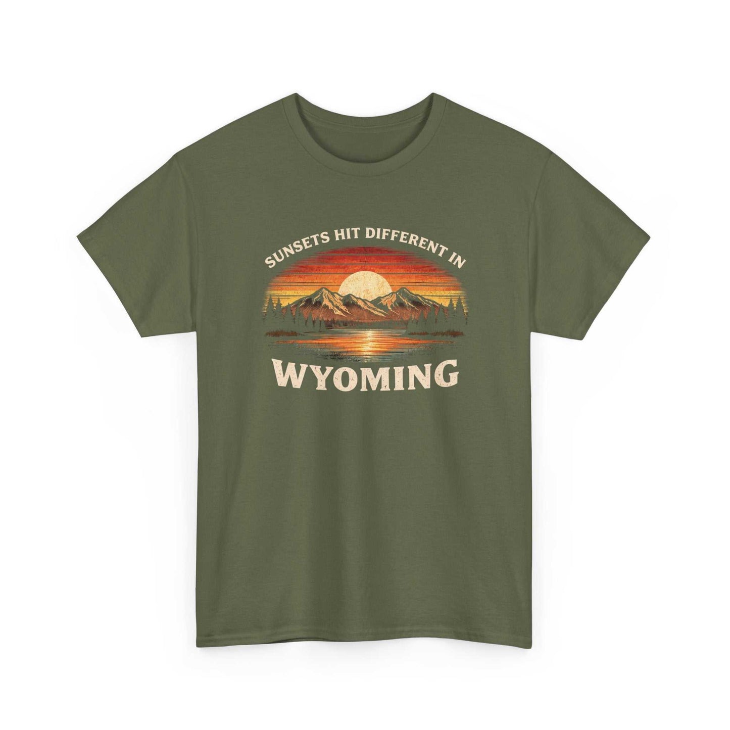 Wyoming Sunset Graphic T-Shirt by Big Sky Ranch Co. featuring mountain and sunset design with "Sunsets Hit Different in Wyoming" text.