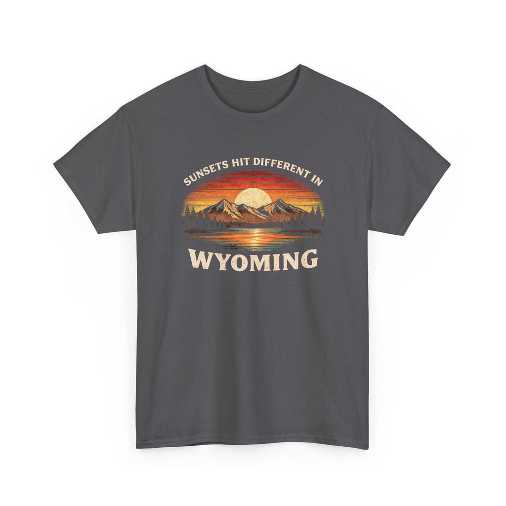 Big Sky Ranch Co. Wyoming Sunset graphic T-shirt featuring mountain design and "Sunsets Hit Different in Wyoming" text.