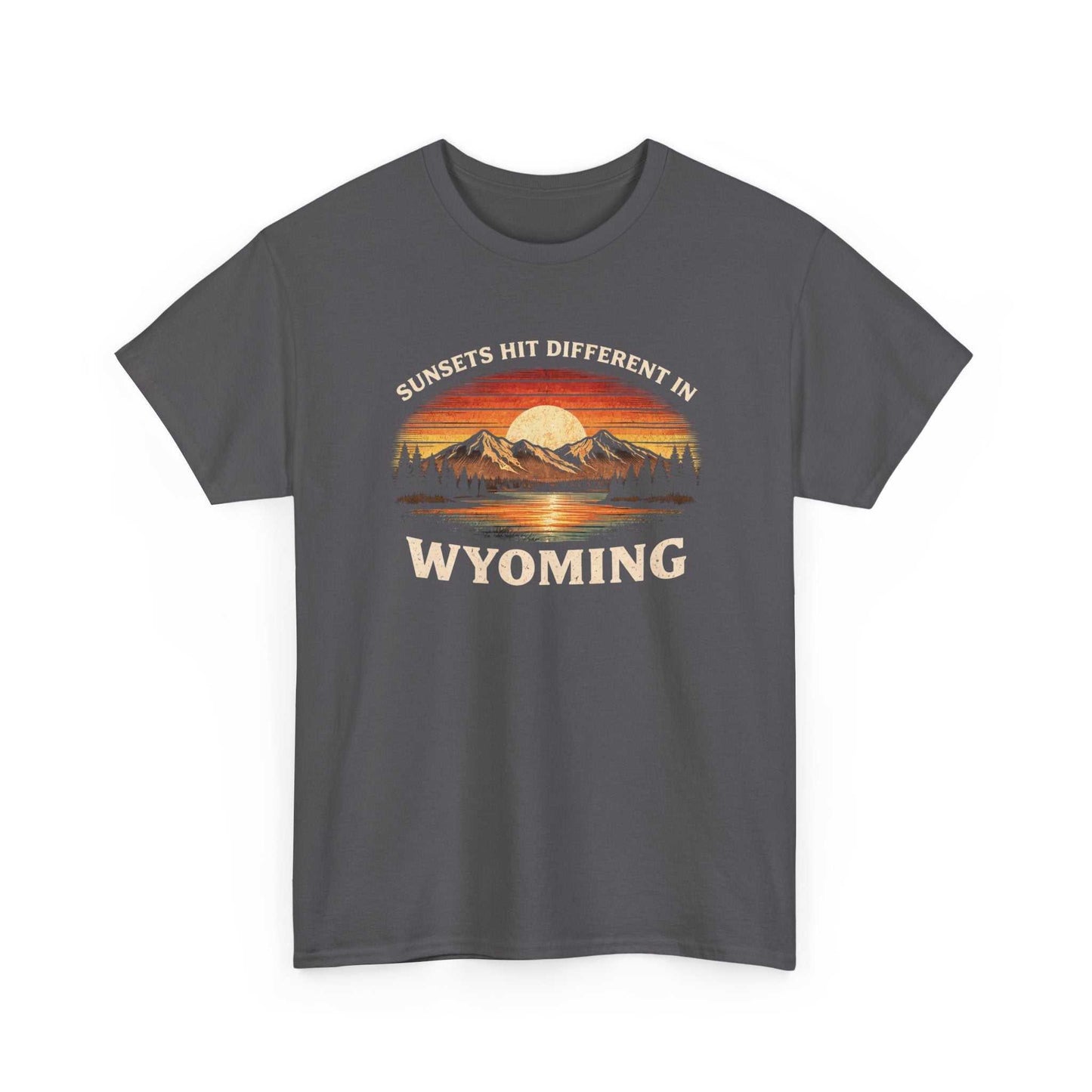 Big Sky Ranch Co. Wyoming Sunset graphic T-shirt featuring mountain design and "Sunsets Hit Different in Wyoming" text.