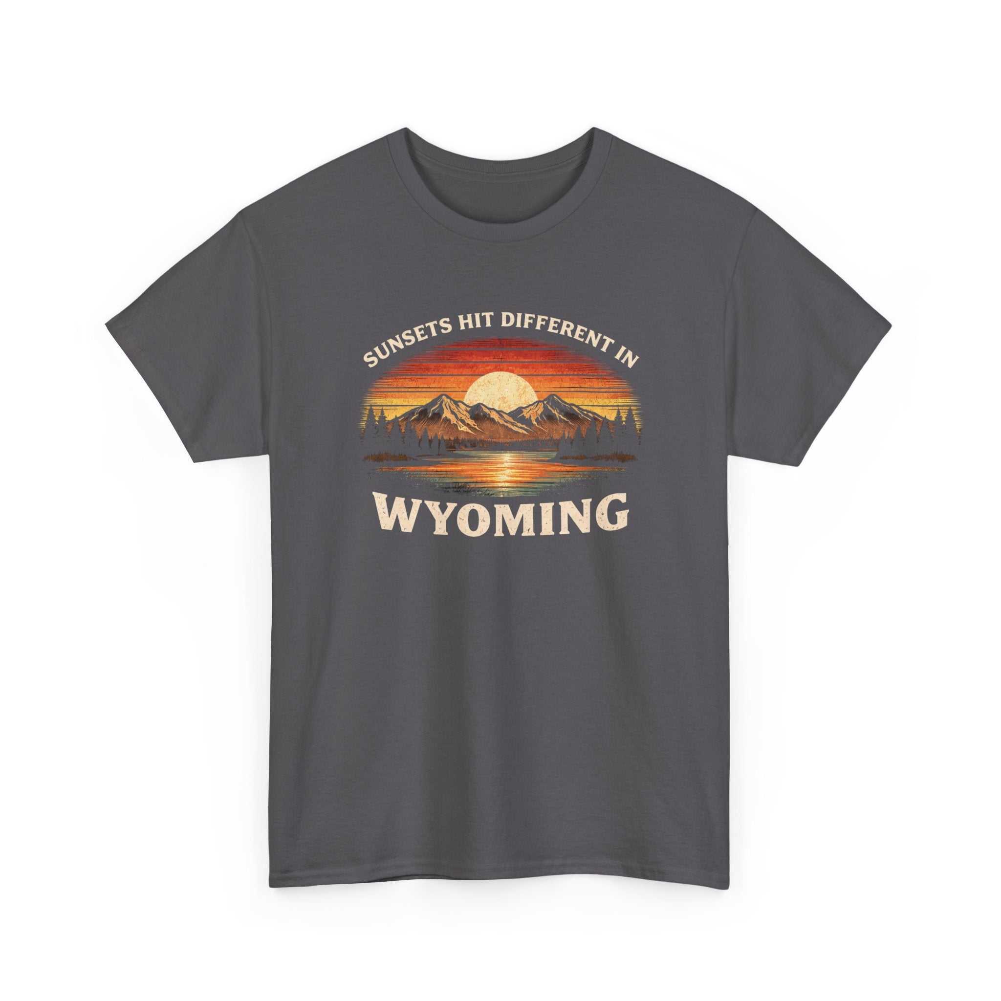 Big Sky Ranch Co. Wyoming Sunset graphic T-shirt featuring mountain design and "Sunsets Hit Different in Wyoming" text.