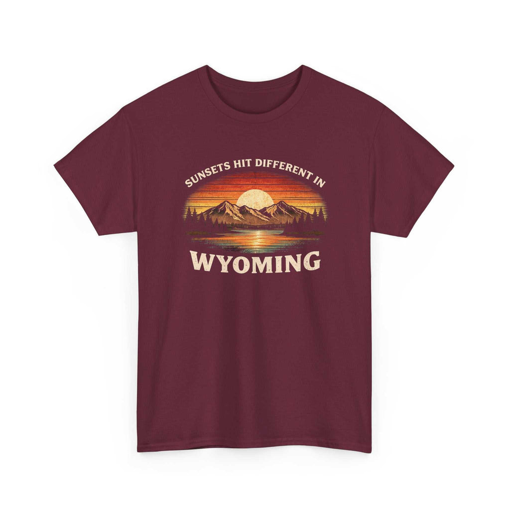 Big Sky Ranch Co. Wyoming Sunset graphic T-shirt featuring mountain and sunset design with "Sunsets Hit Different in Wyoming" text.