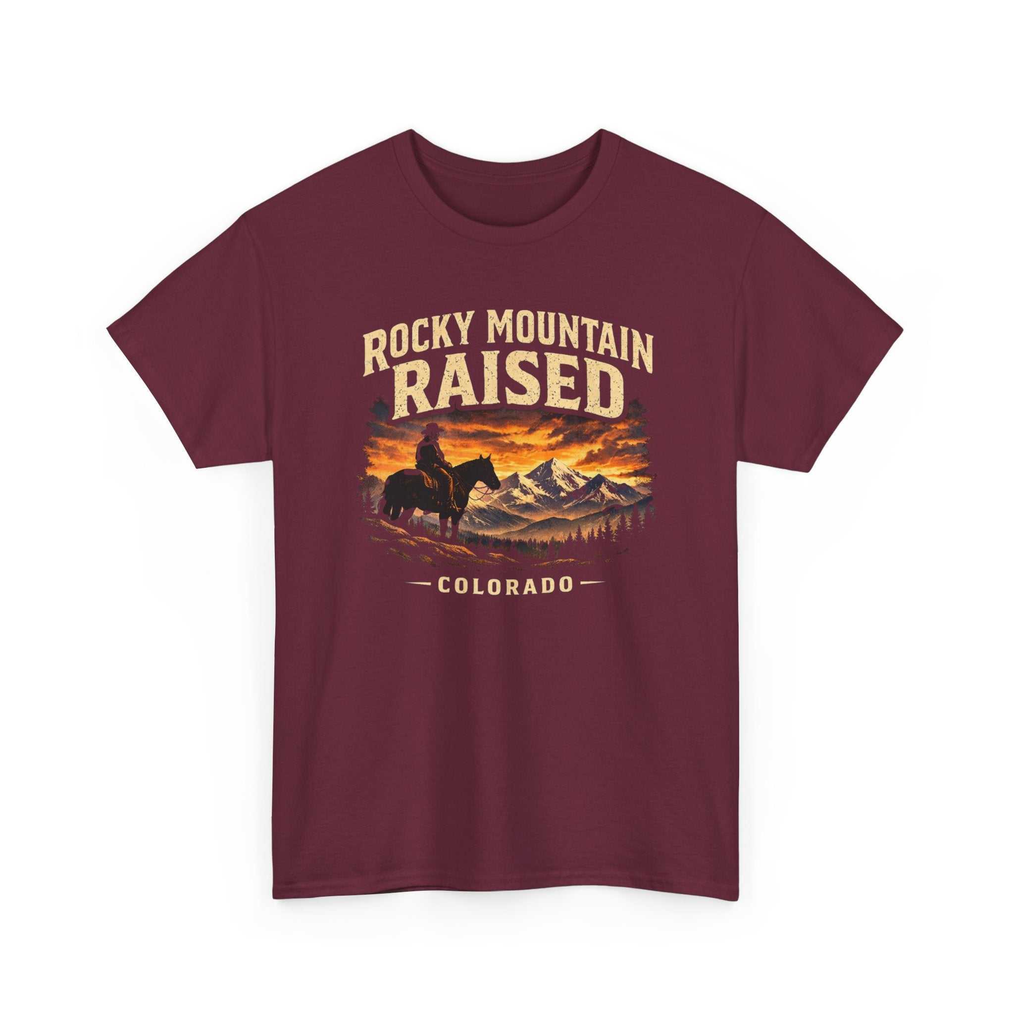 Big Sky Ranch Co. Rocky Mountain Raised Colorado T-Shirt featuring a western cowboy sunset design on soft fabric.
