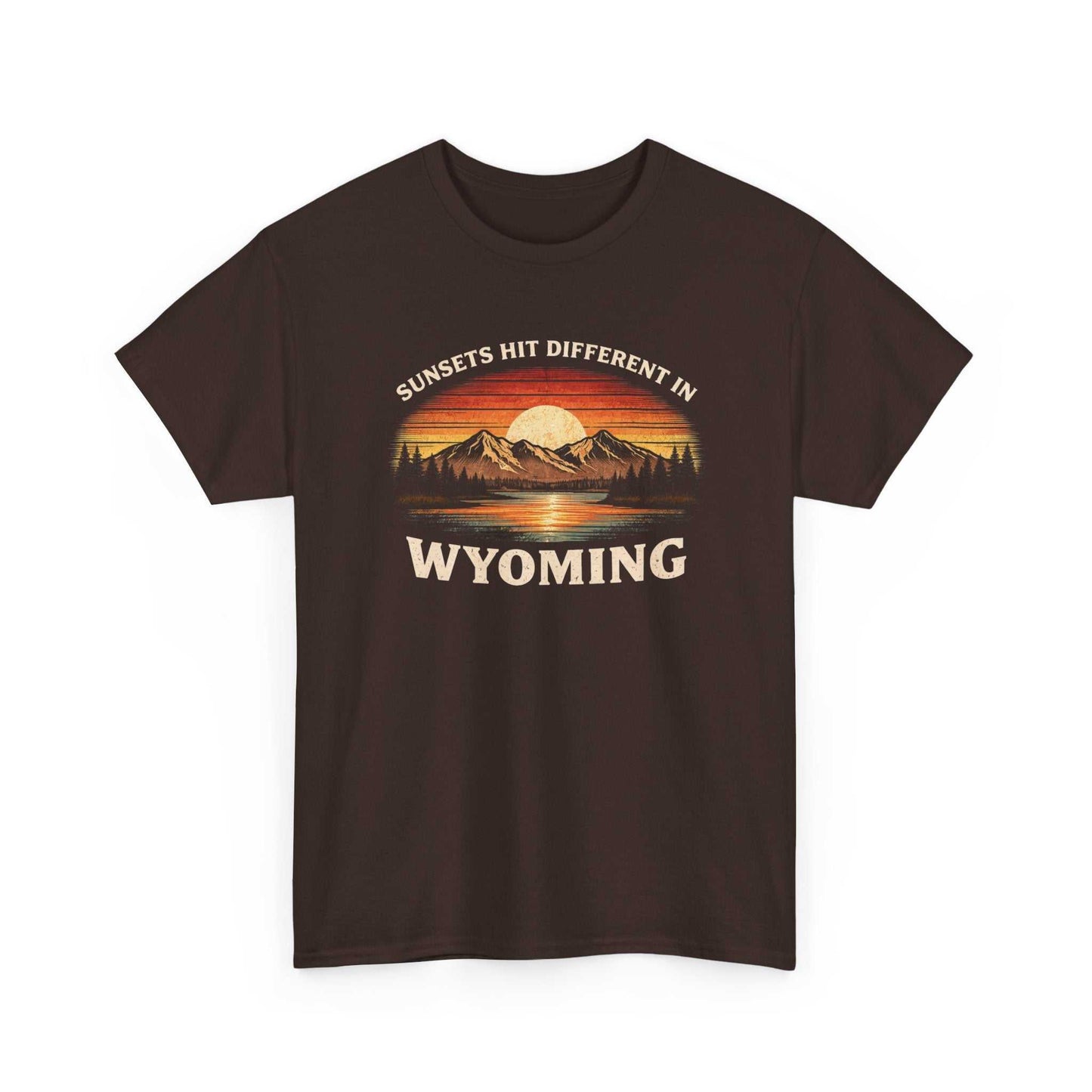 Big Sky Ranch Co. Wyoming Sunset graphic T-shirt featuring mountain and sunset design with "Sunsets Hit Different in Wyoming" text.
