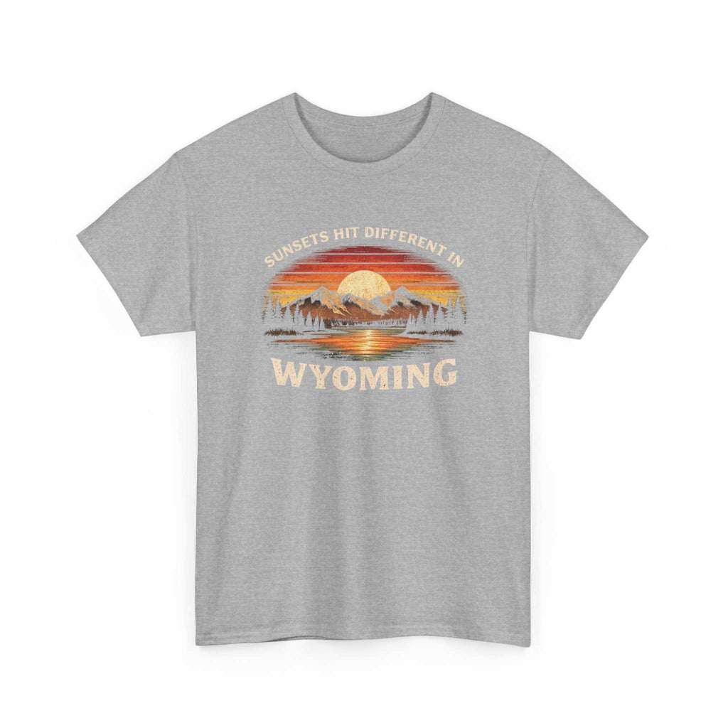Big Sky Ranch Co. Wyoming Sunset Graphic T-Shirt featuring mountain and sunset design with the phrase "Sunsets Hit Different in Wyoming".