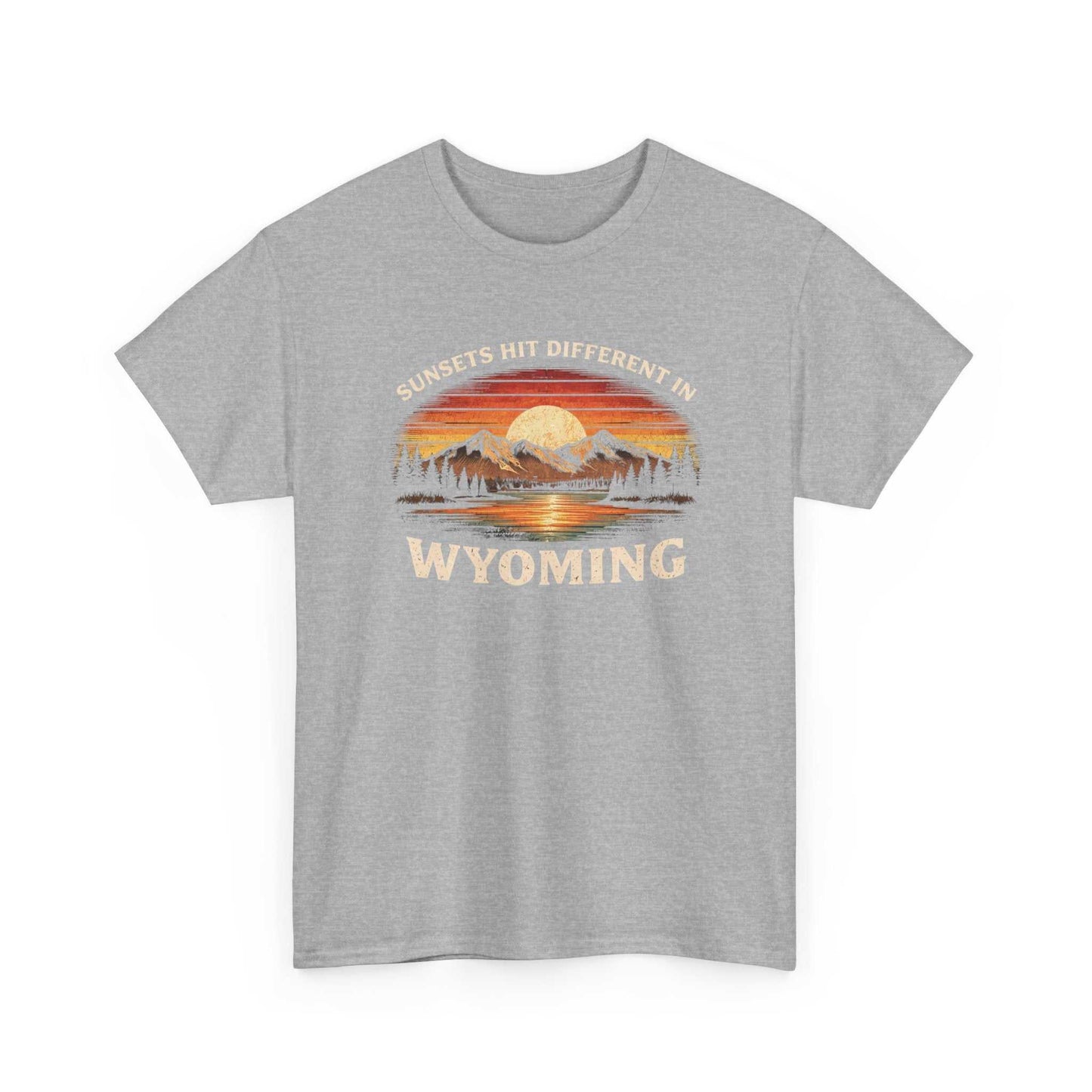 Big Sky Ranch Co. Wyoming Sunset Graphic T-Shirt featuring mountain and sunset design with the phrase "Sunsets Hit Different in Wyoming".