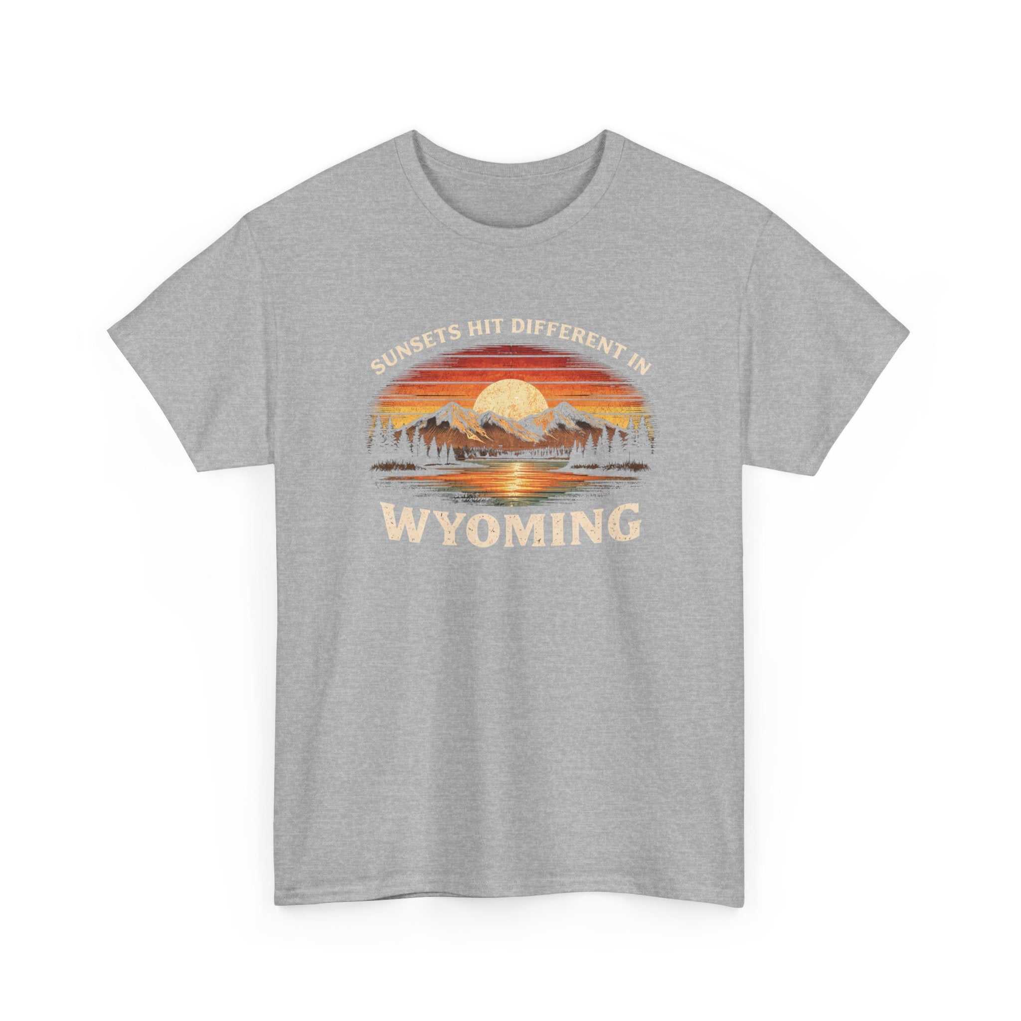 Big Sky Ranch Co. Wyoming Sunset Graphic T-Shirt featuring mountain and sunset design with the phrase "Sunsets Hit Different in Wyoming".