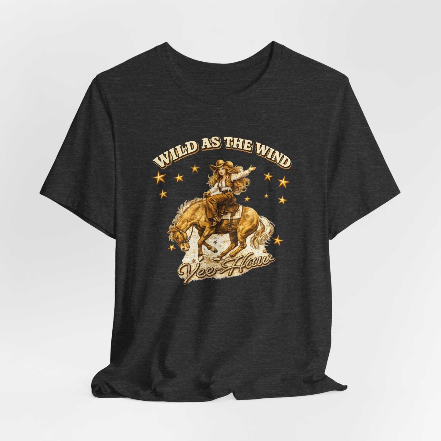 Wild as the Wind cowgirl T-shirt by Big Sky Ranch Co. featuring vintage western rodeo graphic on a classic casual tee.