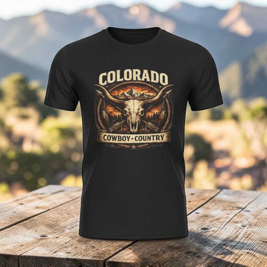 Colorado Cowboy Country T-shirt featuring a vintage longhorn skull design with rugged Western typography, mountain accents, and a distressed retro style
