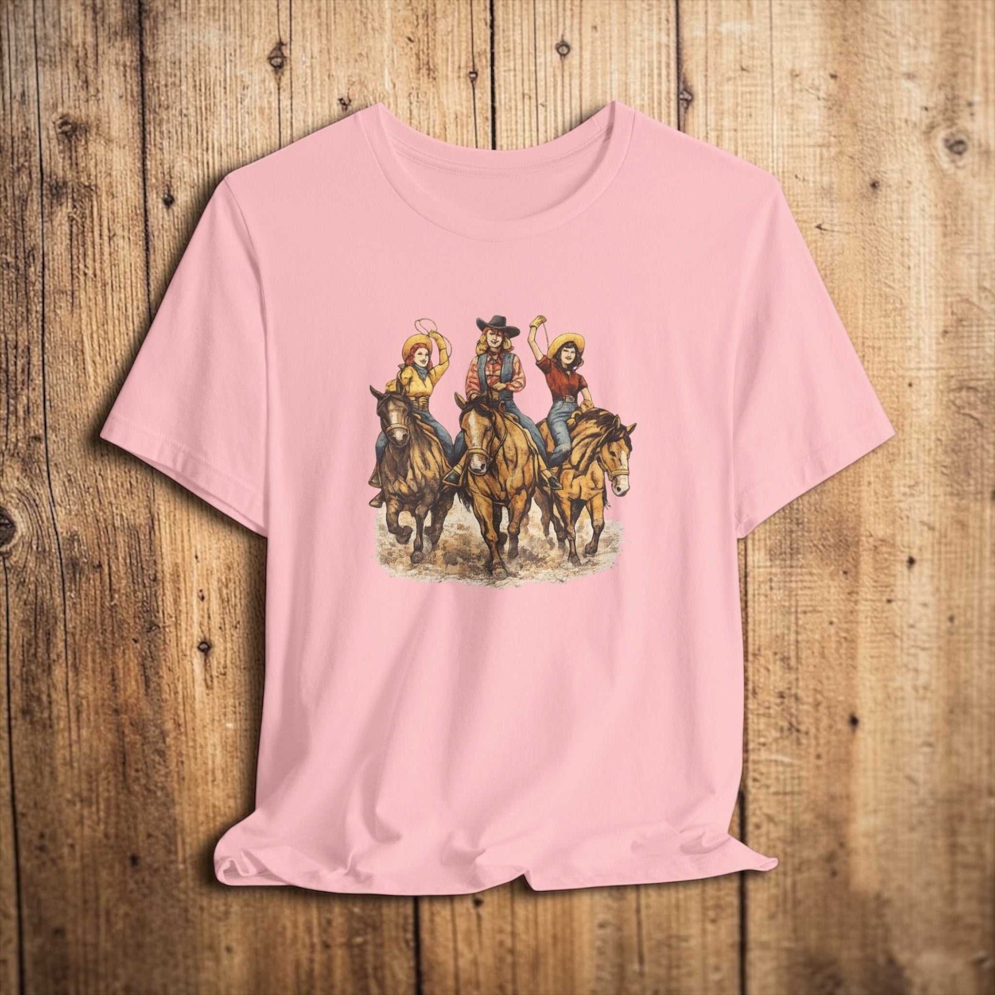 Cowgirl Trio riding horses Western rodeo graphic T-shirt by Big Sky Ranch Co. featuring a western rodeo scene on a casual tee.