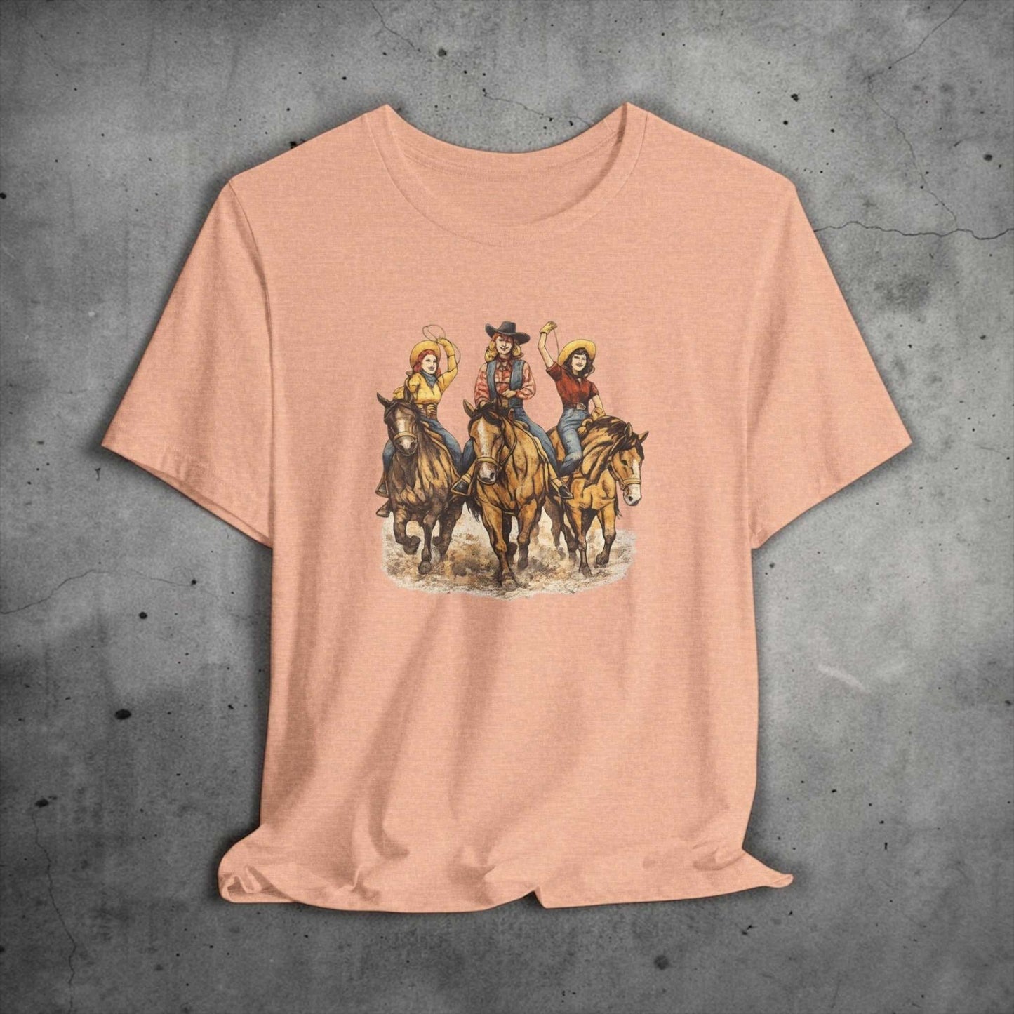 Big Sky Ranch Co. Cowgirl Trio Riding Horses Western Rodeo graphic T-shirt, featuring vibrant rodeo-inspired design.