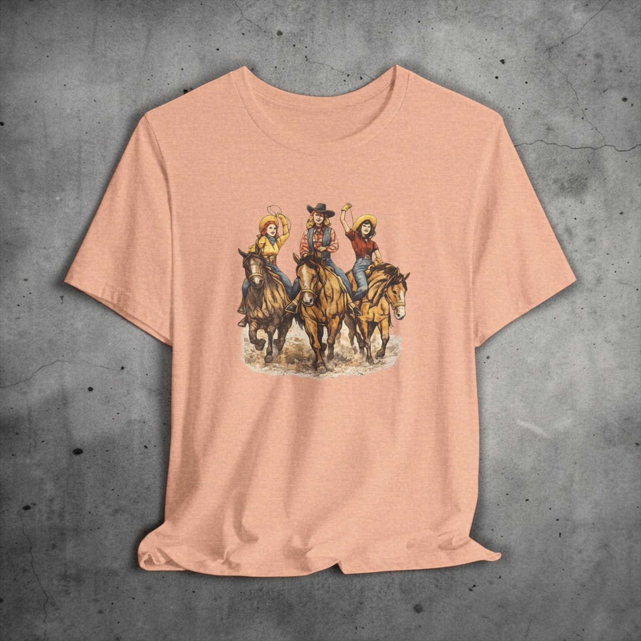 Big Sky Ranch Co. Cowgirl Trio Riding Horses Western Rodeo graphic T-shirt, featuring vibrant rodeo-inspired design.