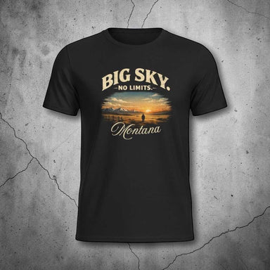 Big Sky Montana T-shirt featuring a vintage sunset landscape with wide-open plains, mountain silhouettes, and a retro distressed outdoor design