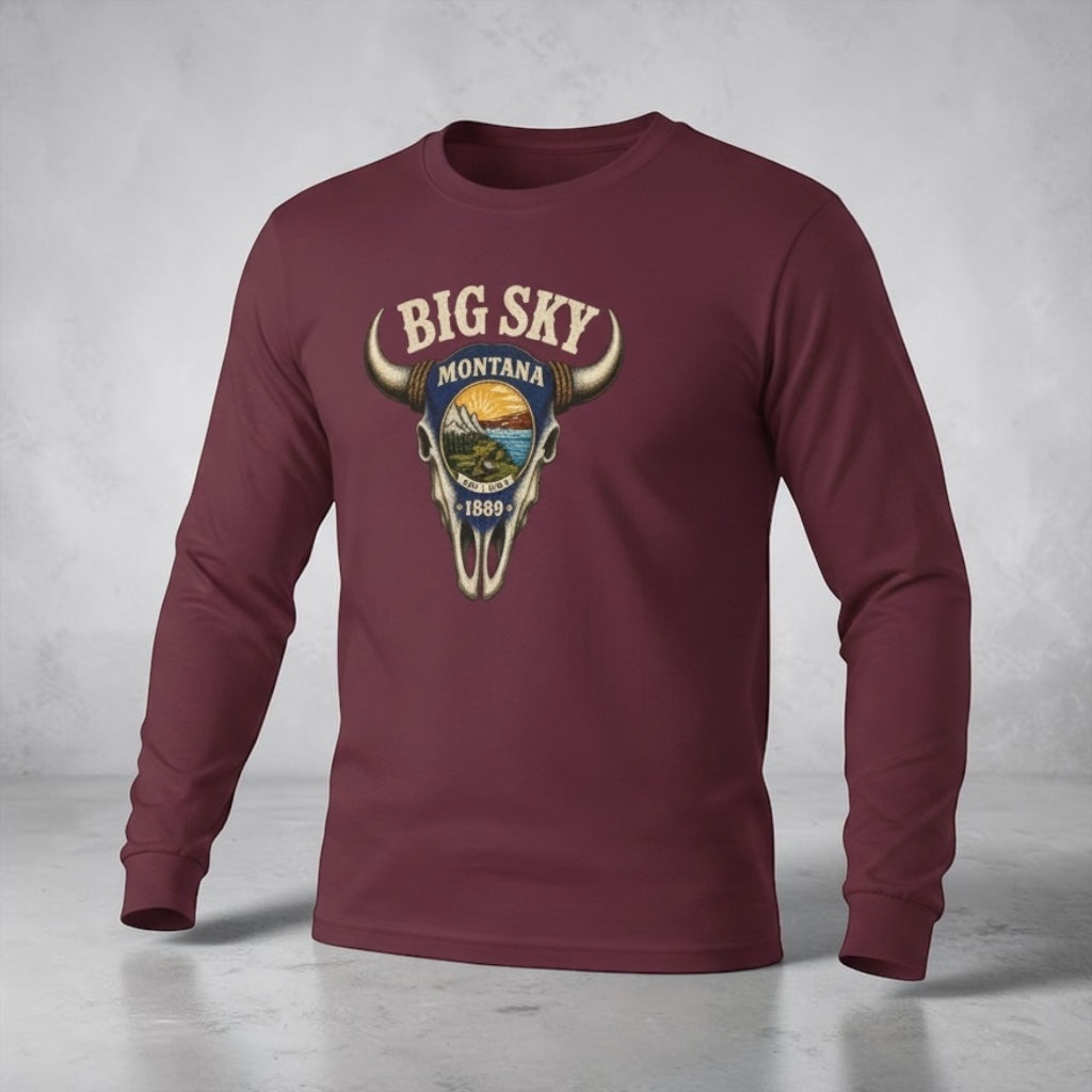 Unisex long sleeve tee by Big Sky Ranch Co. featuring a Western skull and scenic Montana landscape graphic.