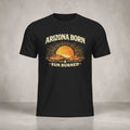 Arizona Born & Sun Burned T-Shirt by Big Sky Ranch Co. featuring a desert sunset graphic on a casual T-shirt.