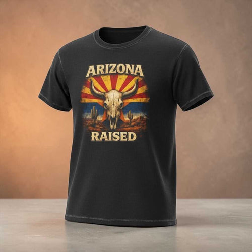 Arizona Raised T-Shirt by Big Sky Ranch Co. featuring a desert skull and retro flag design on soft cotton fabric.