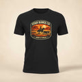 Big Sky Ranch Co. Keep It Wild cowboy sunset T-shirt featuring a vibrant sunset and wilderness design on soft cotton fabric.